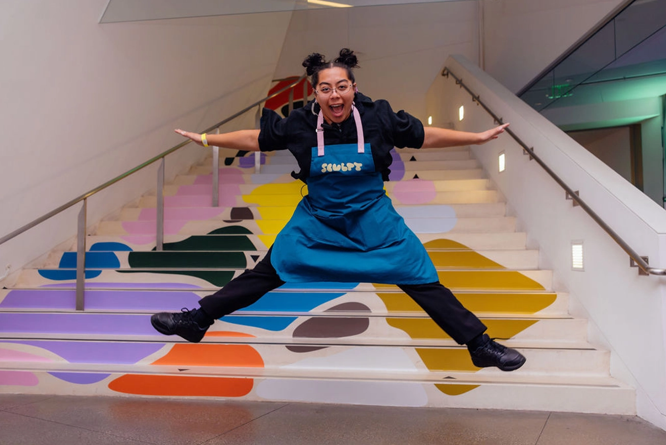 Interview filmed beside colorful event installation