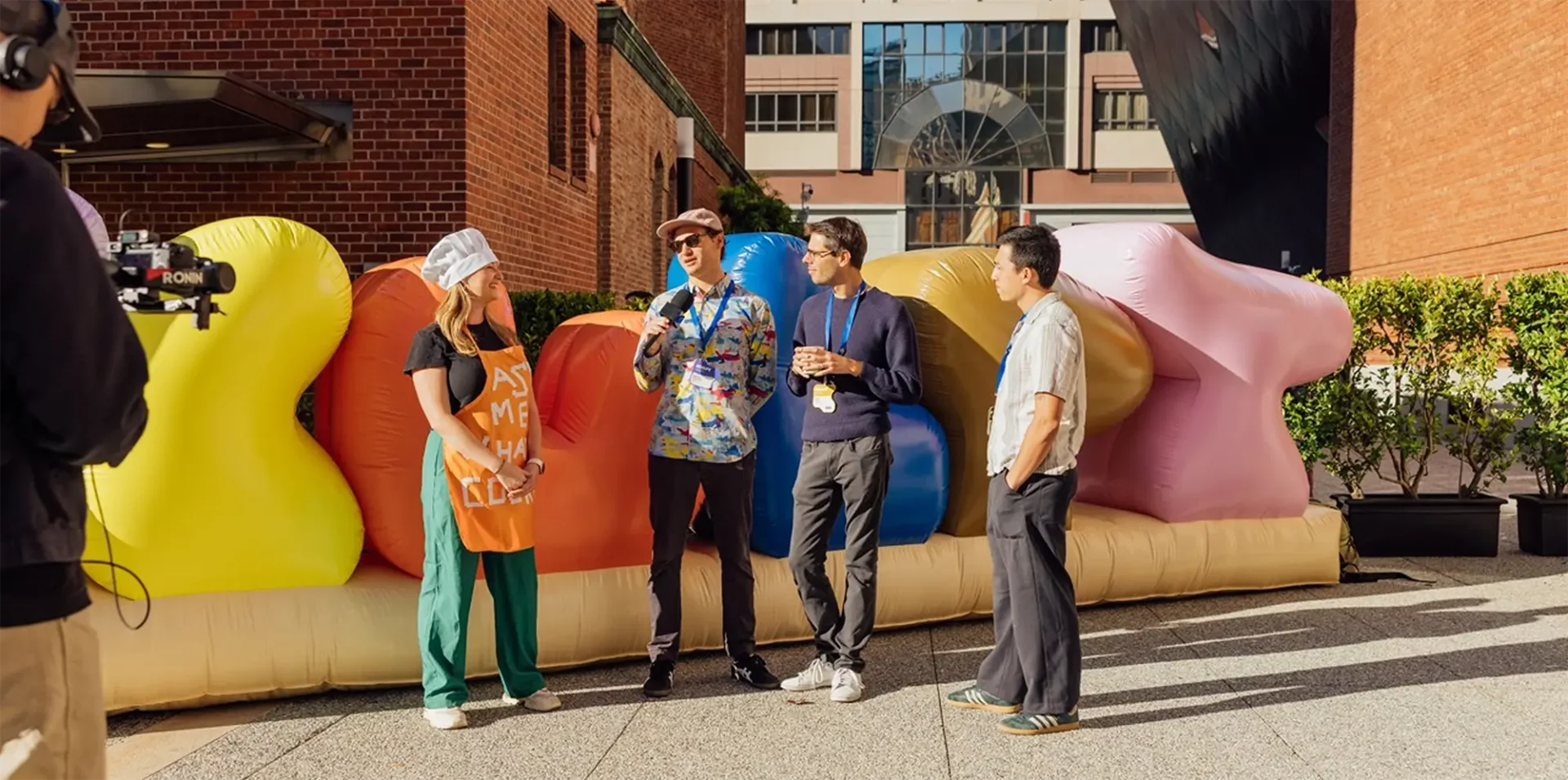 Outdoor interview near inflatable backdrop